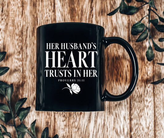 Her Husband’s Heart Trusts in Her Proverbs 31:11 Black Coffee Mug